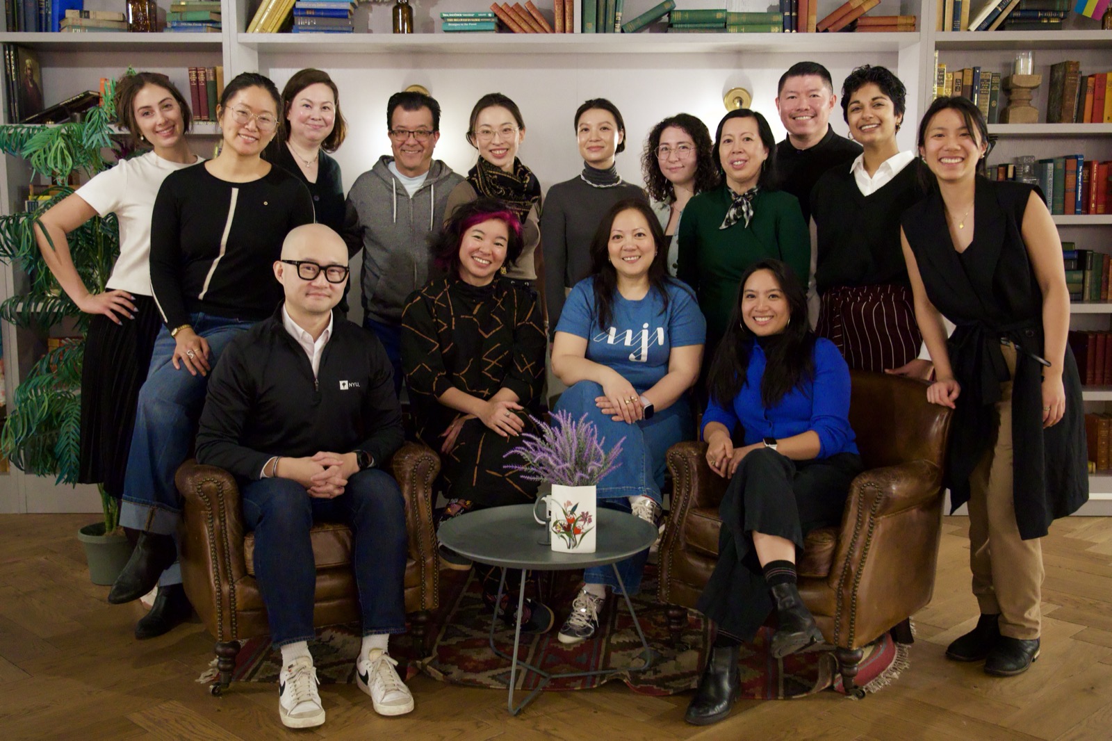 AAJA members gathered for a group photo in a library lounge